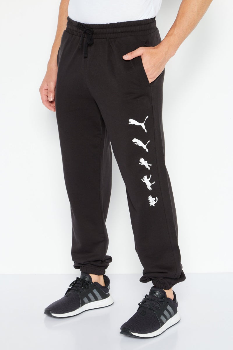 PUMA Men Regular Fit Graphic Printed Sweatpants, Black - Image 3